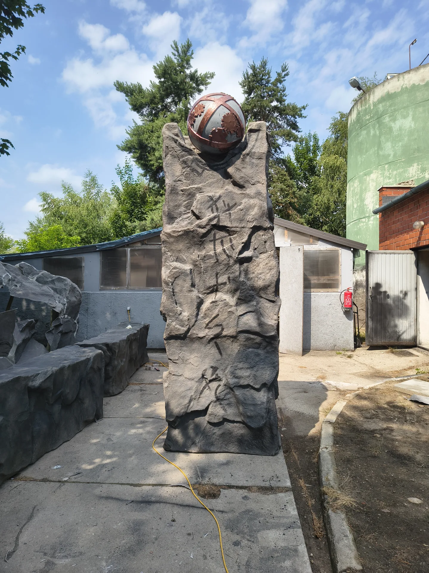Three-dimensional decorations and imitations 1 Industrial monolith with a fibreglass sphere, made for a theatre